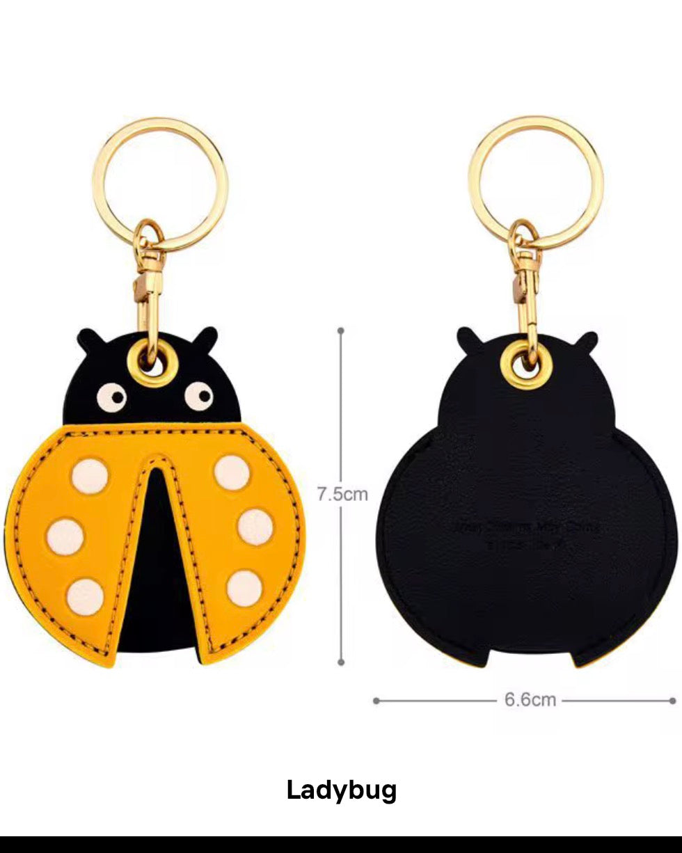 Little Explorer Universal Tracker Charm — Yellow Ladybug — product image 2