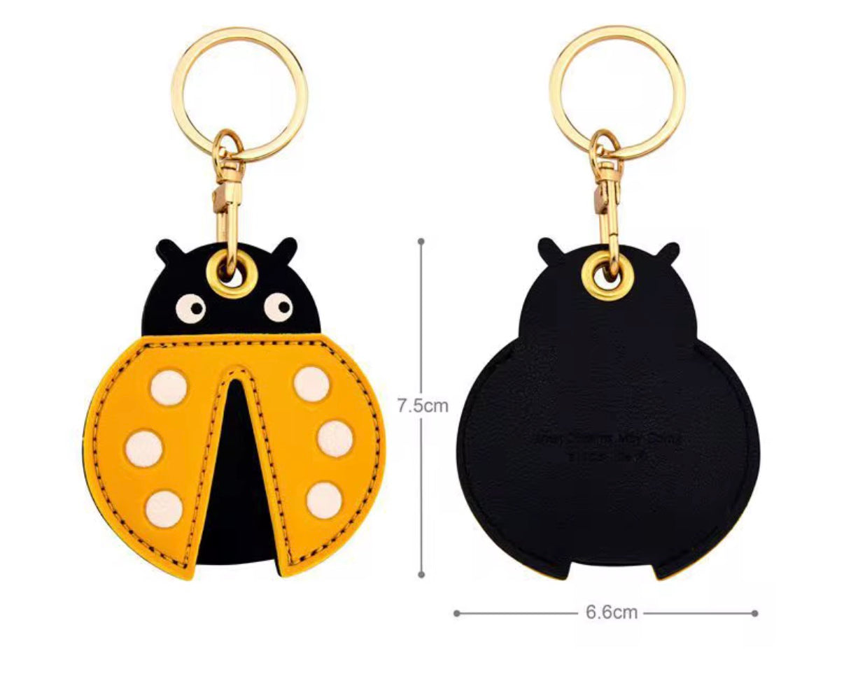 Little Explorer Universal Tracker Charm — Yellow Ladybug — product image 2