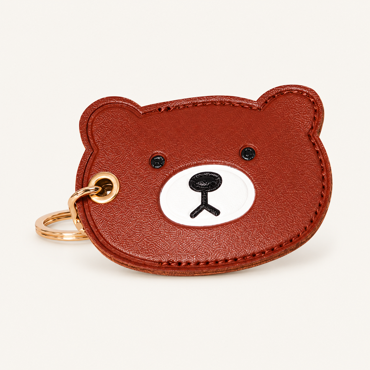 Little Explorer Universal Tracker Charm — Brown Bear on soft ivory background