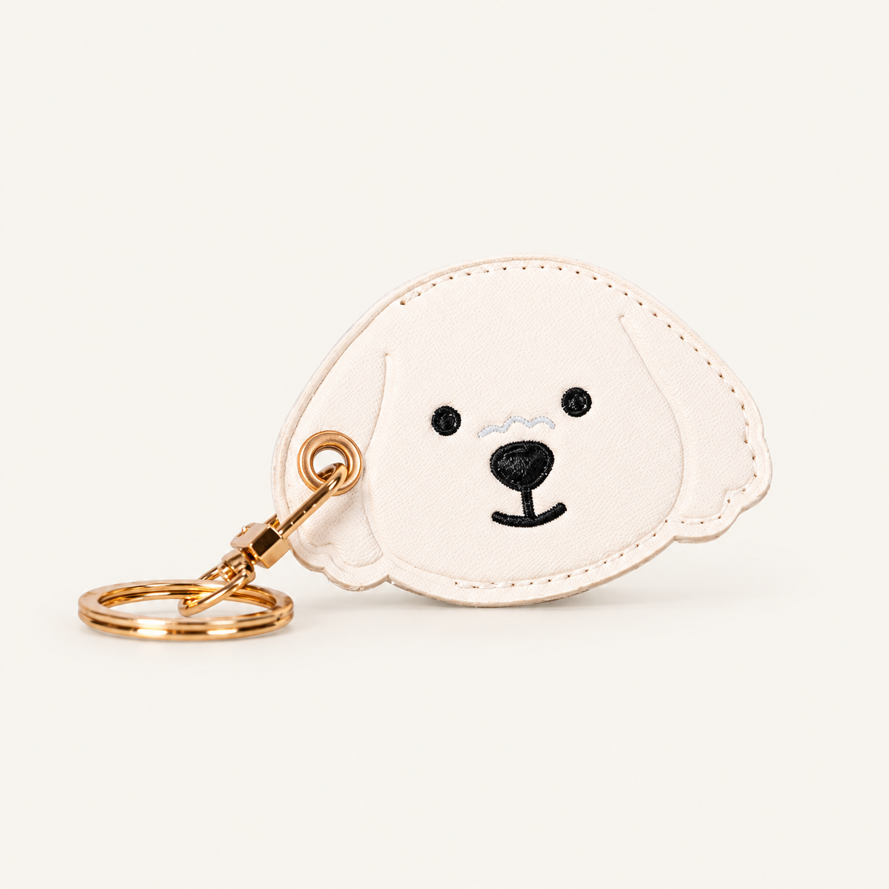 Little Explorer Universal Tracker Charm — White Dog on soft ivory background