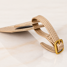 Wayfinder luggage tag — Metallic Champagne — slim side profile and buckle strap — all-groups